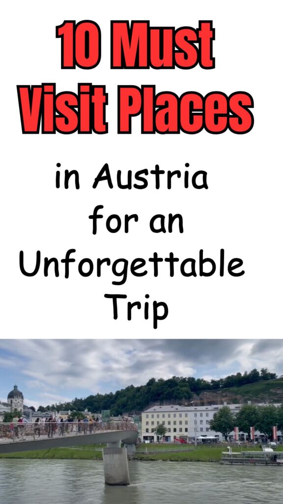 A panoramic view of Austria’s mountain village Hallstatt surrounded by alpine peaks and a serene lake.