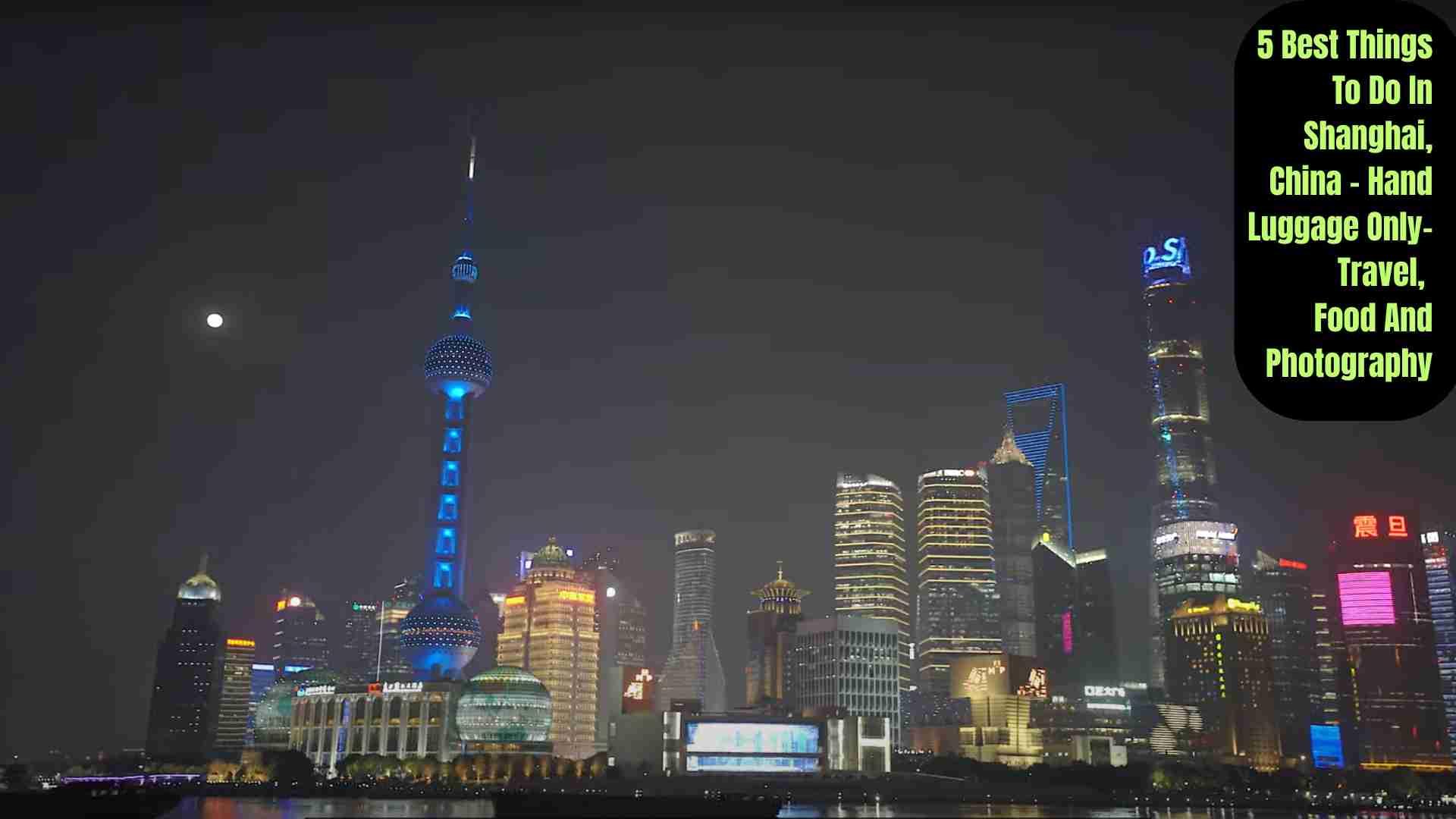 A scenic view of Shanghai’s skyline with the Oriental Pearl Tower at dusk