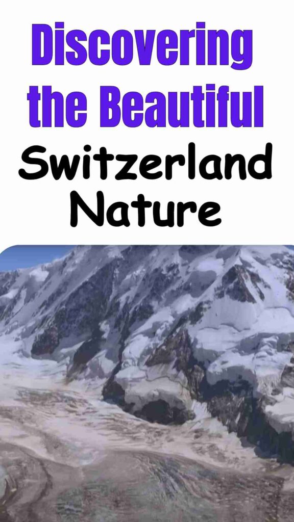 A scenic view of Switzerland’s mountains, crystal-clear lake, and green valleys under a bright blue sky