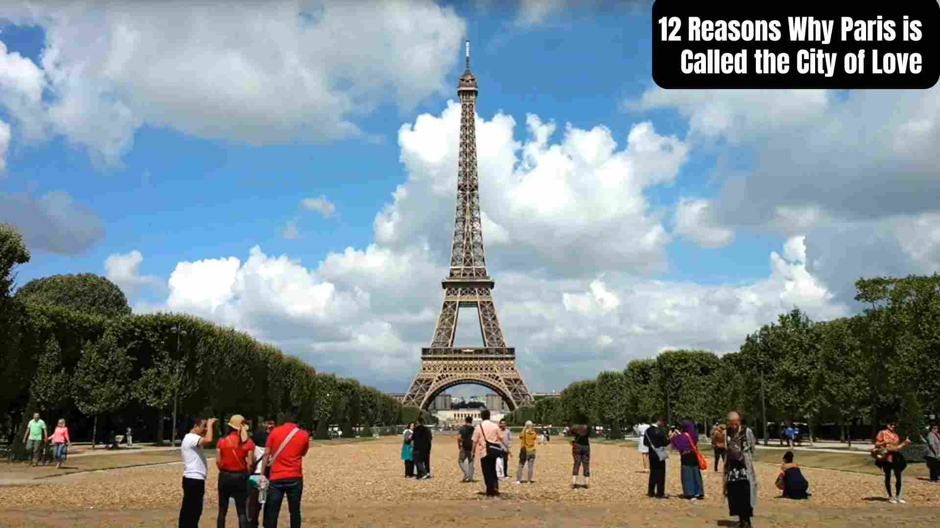 Romantic view of Paris with the Eiffel Tower sparkling at night, couples walking along the Seine River, cozy candlelit cafés, and iconic landmarks showcasing why Paris is called the City of Love.